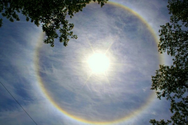 Sun halo with a rainbow