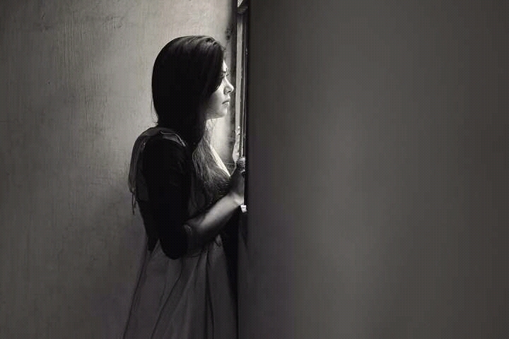 Lonely Girl By The Window.