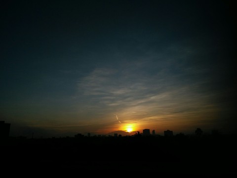 Sun rise in a city