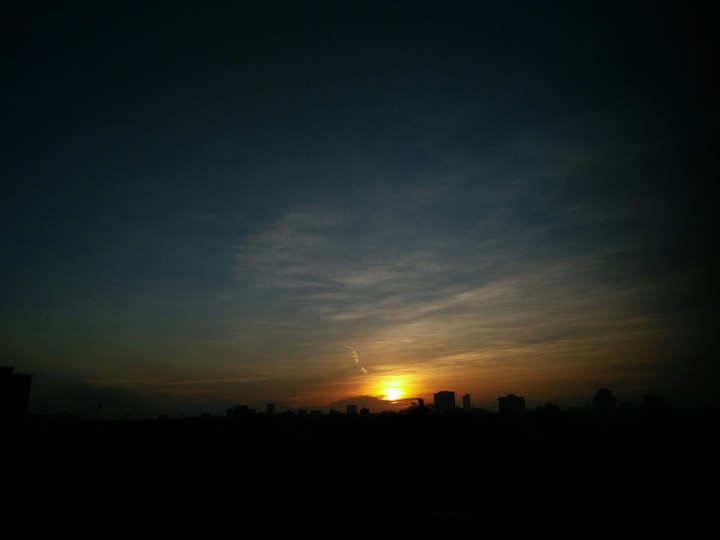 Sun rise in a city