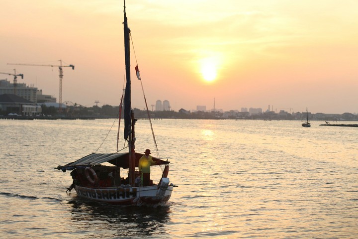 fisherman in sunset