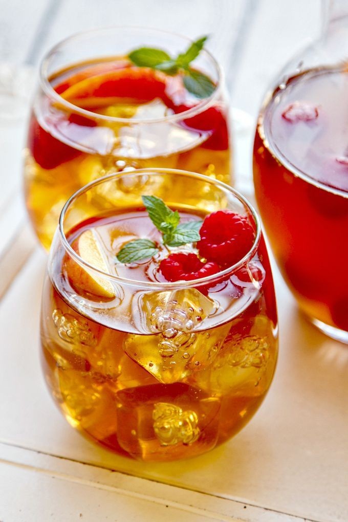 Sweet tea sangria with raspberries alnd fresh peaches⚘
