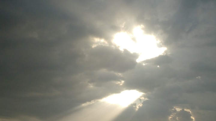 Dark Clouds with a beam of light