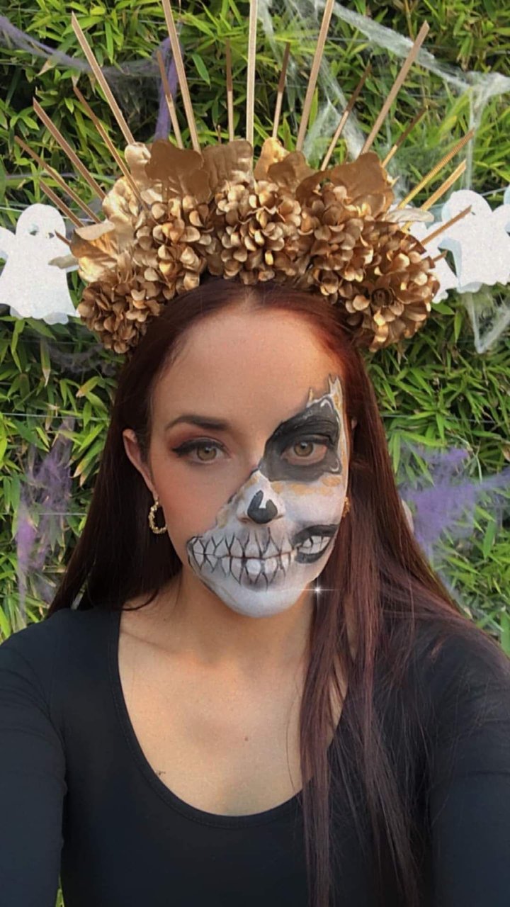 my beautiful niece dressed as a Cuatrina. on the day of the