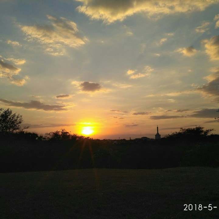 a Sunset and a monument