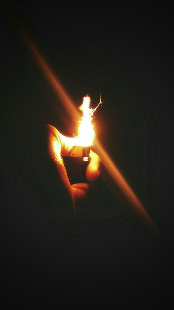 #girl #lighter #flame #fire #black #black and yellow #prayer