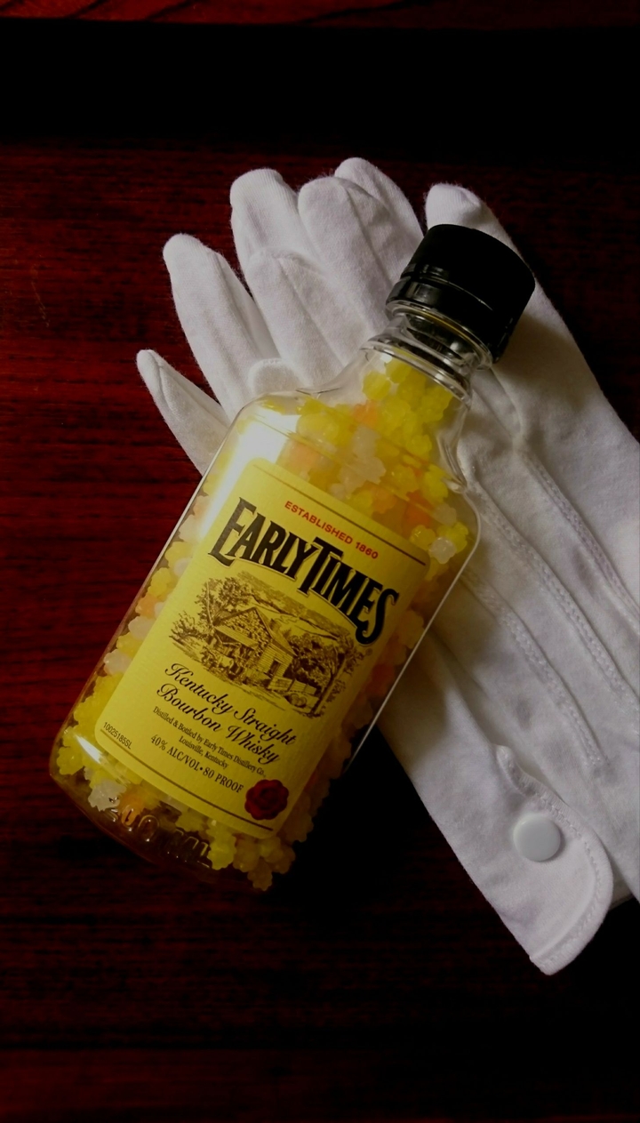 compeito in whisky bottle