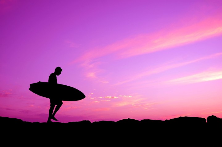 Surfing and Pink Sky