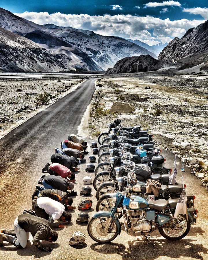 before starting  bike treckking, they are praying for life