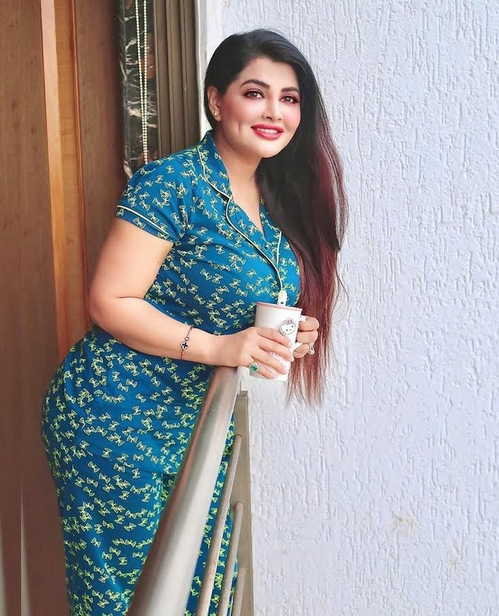 NAINA MOHAMED