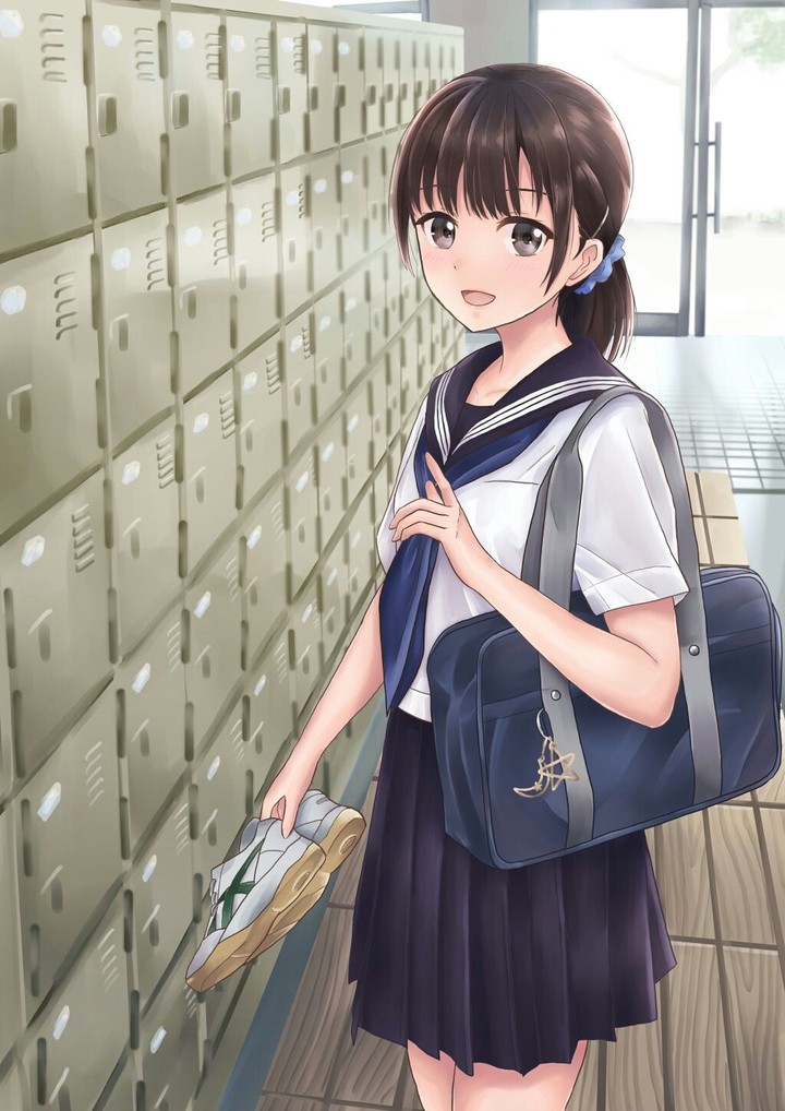 At The entrance to the school
