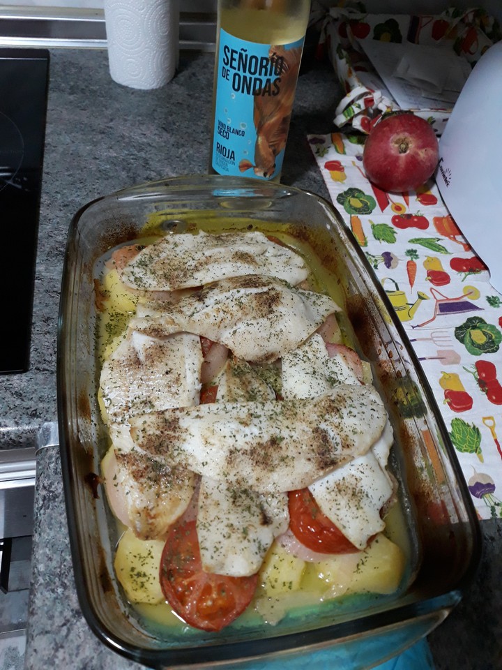 Merluza al horno y vino blanco