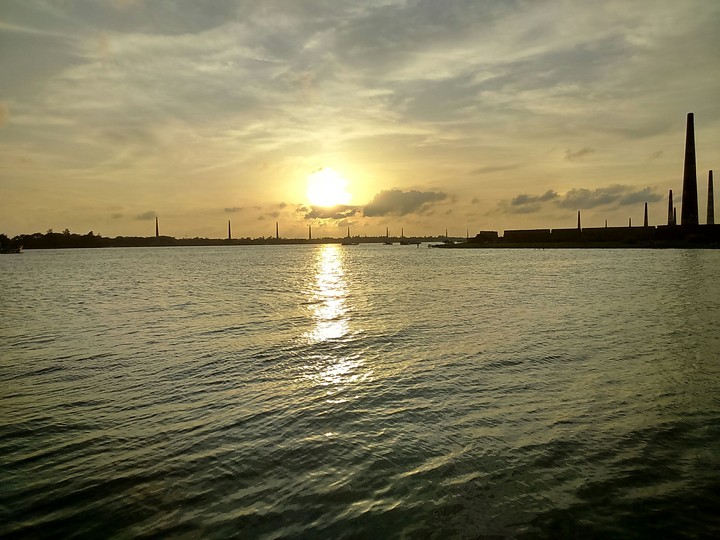 sun set over a river