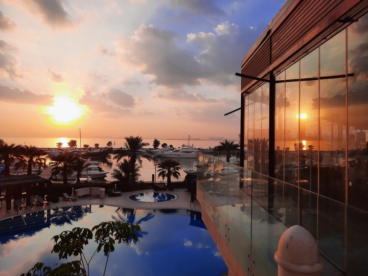 Sun rises over the Persian Gulf Sea