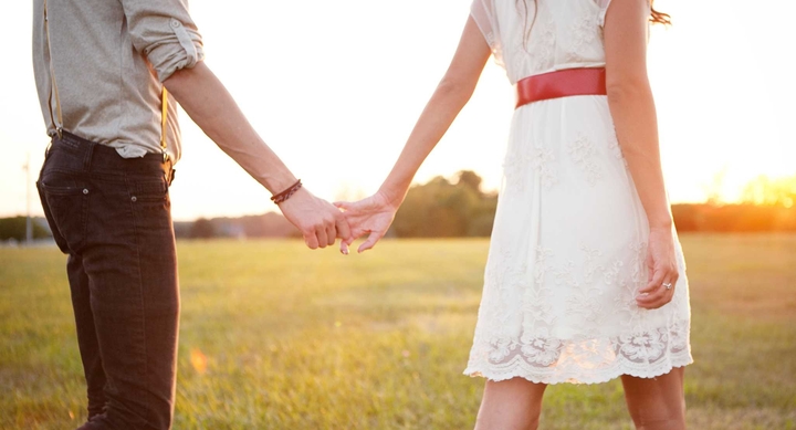 couple holding hands