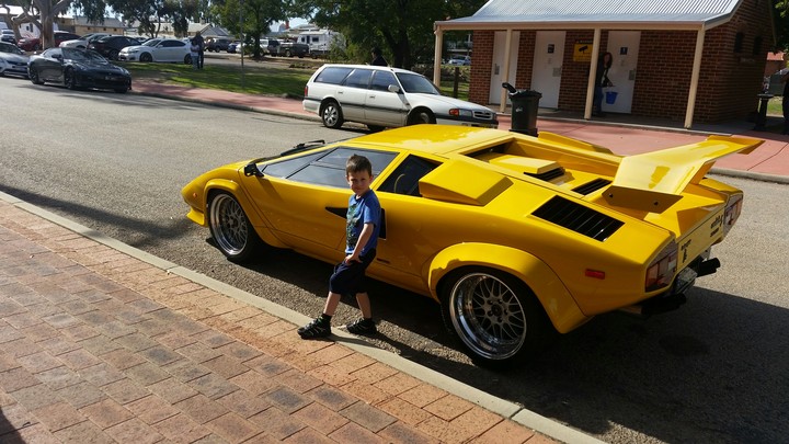 My brother with a sports car