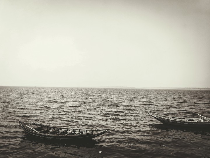 silent boat noisy wave