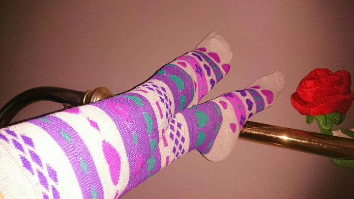 colorful socks in bed