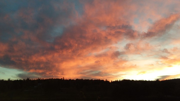 Sunset sky o'er the western hill
