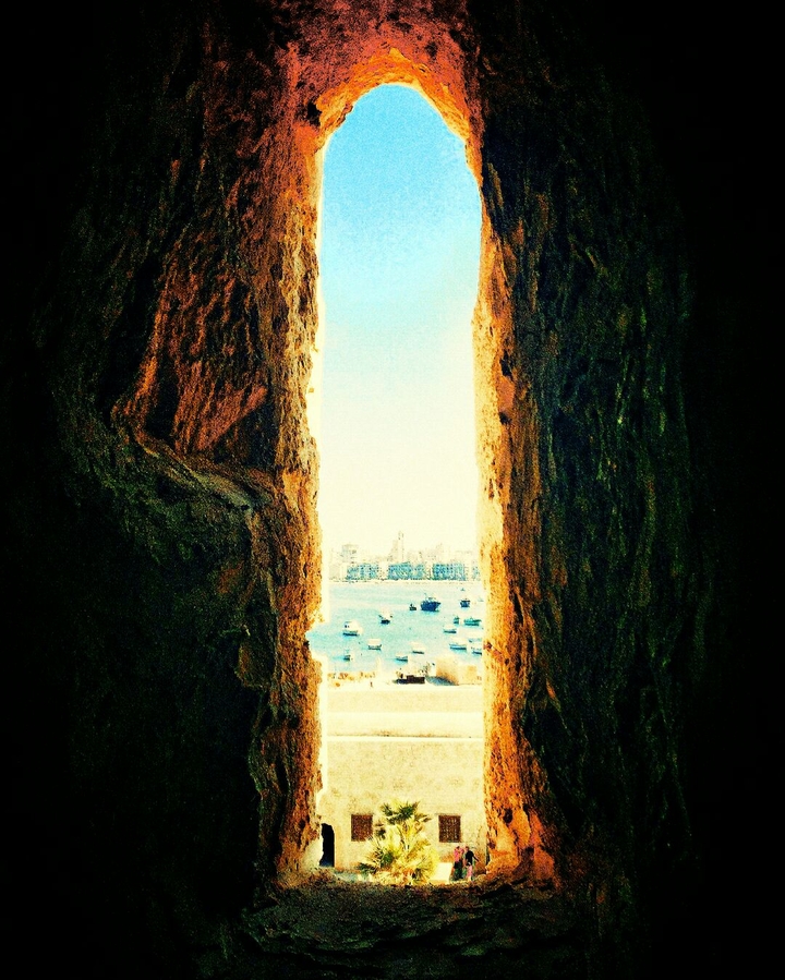window by Stone​ to see sea and boat