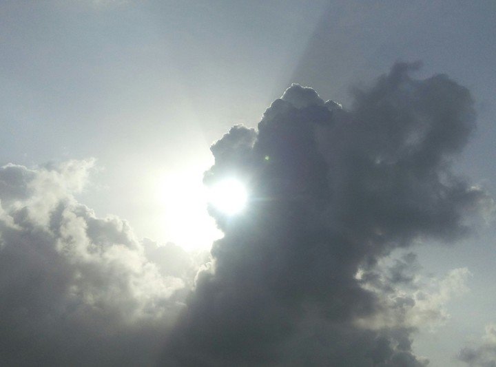 Sun between clouds