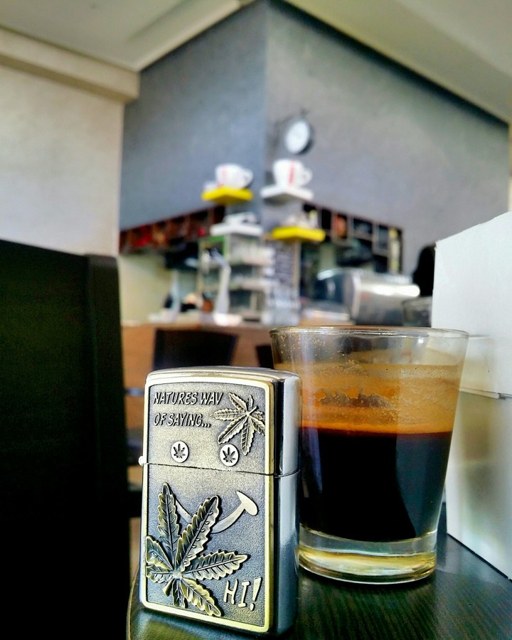 sitting in a cafe and observing people with a zippo