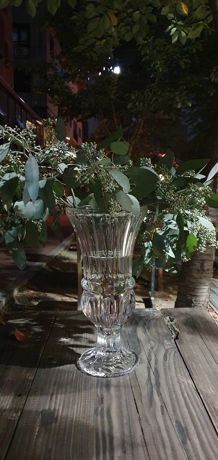Glass vase at night