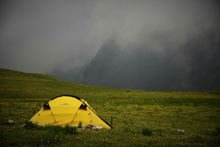 By the tent