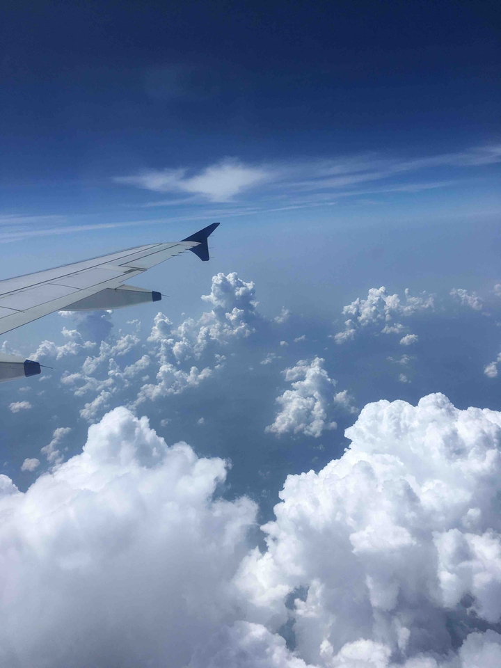 somewhere in the middle of the clouds