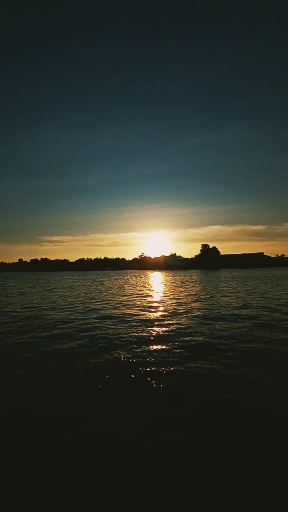sunset by the river.