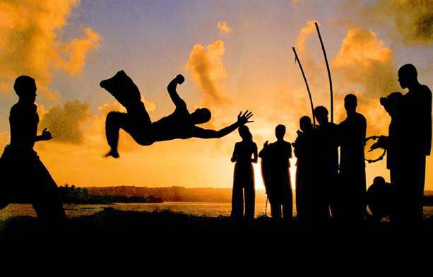 Capoeira mixes martial art, sport and music. Afro-brazilian