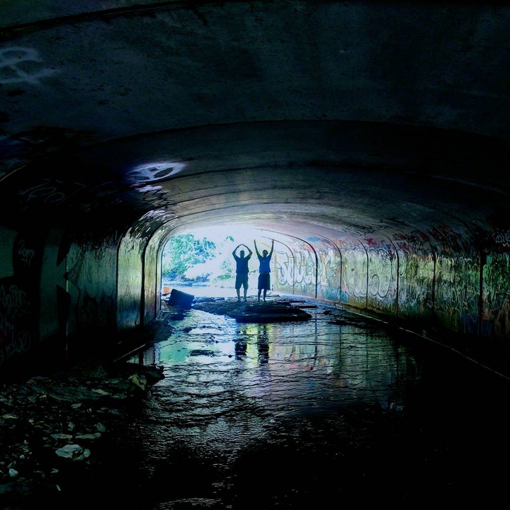 OHio pride in a dark colorful grafetti bridge