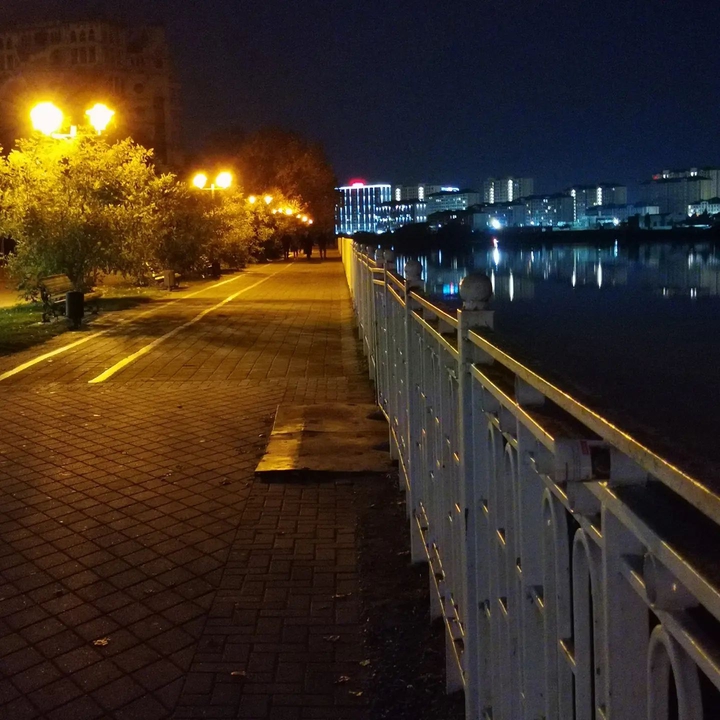 Evening city. Promenade.