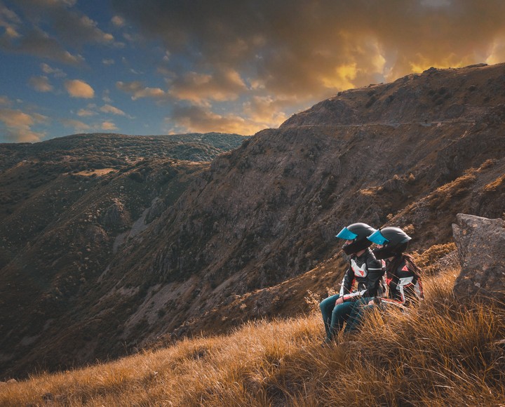 Cyclists Couple Mountains