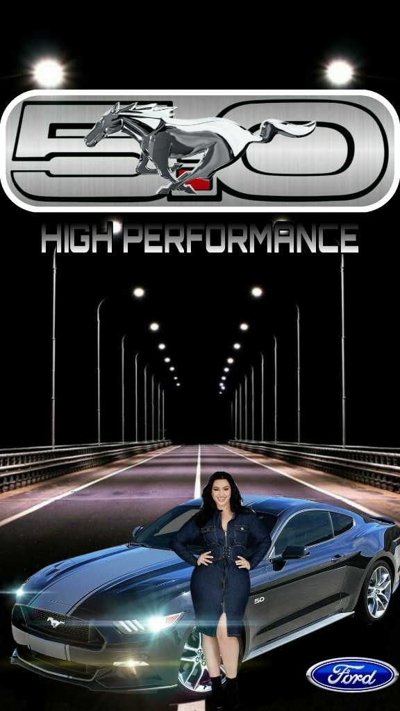 Girl posing beside Ford® Mustang™ GT!