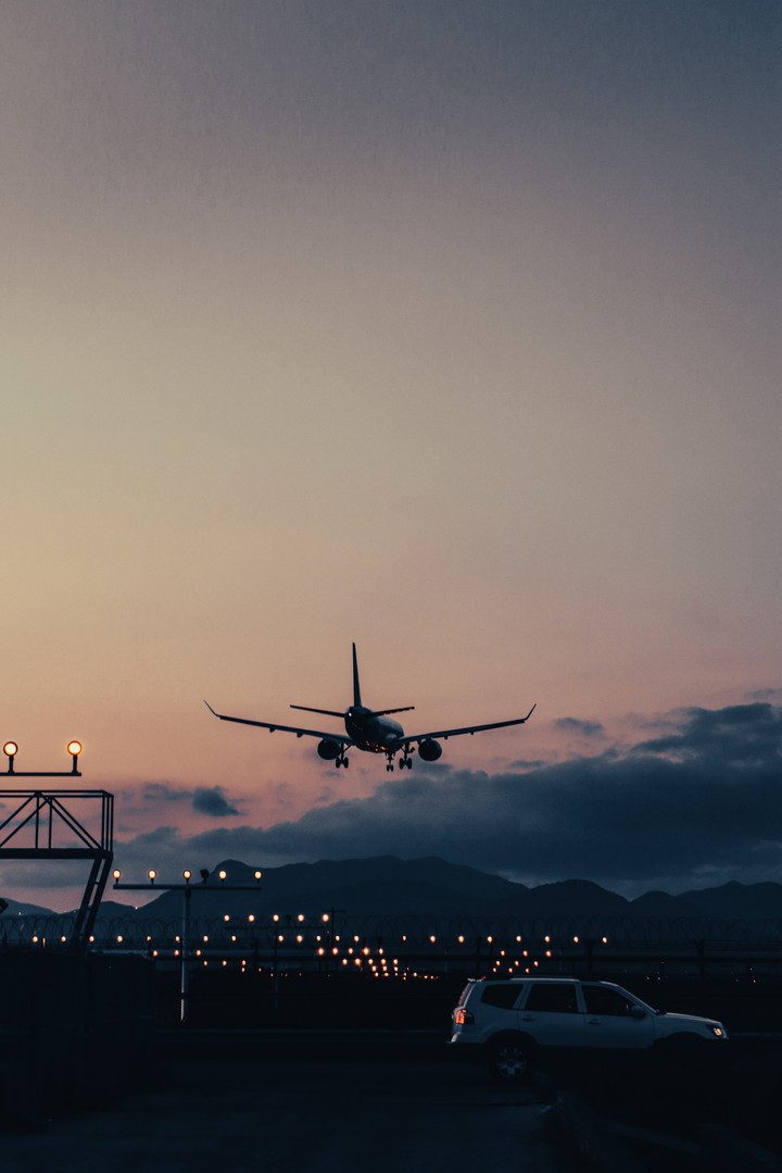 an airplane in the sunset