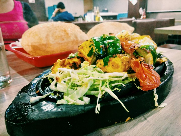 Munch on some paneer tikka sizzler
