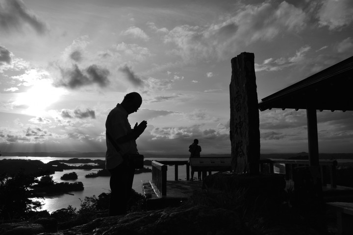 Prayer and photographer
