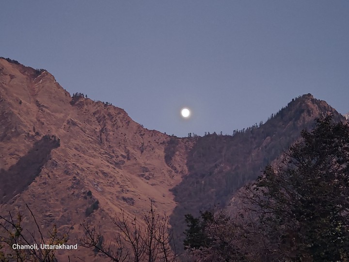 moon behind mountain