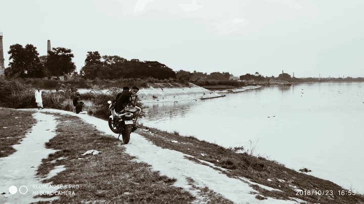 By the river