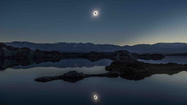A Total Solar Eclipse Reflected