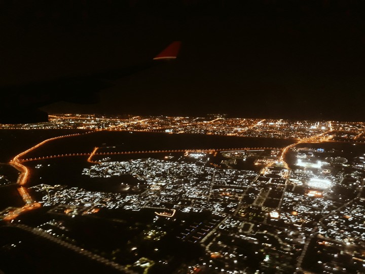above the city