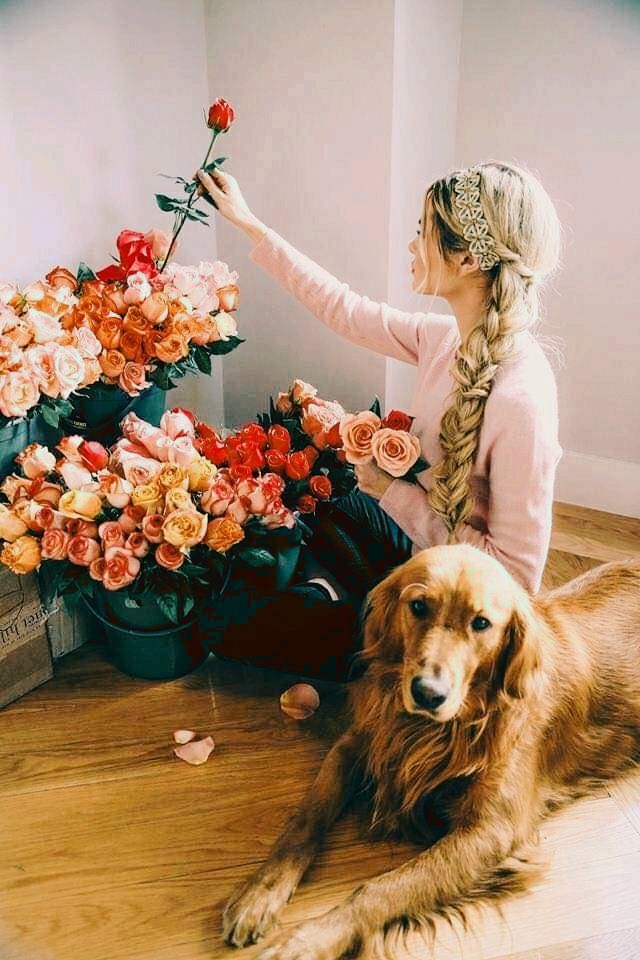 girl with doggie n flowers