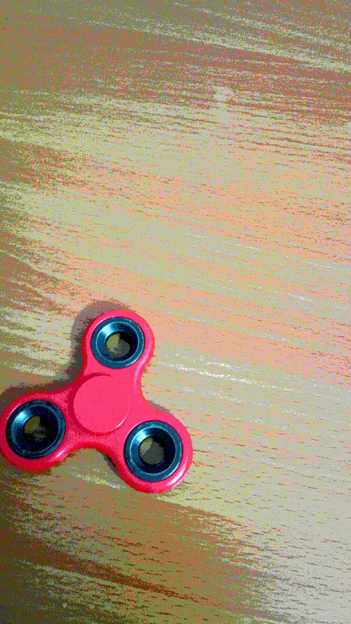 cool fidget spinner on table