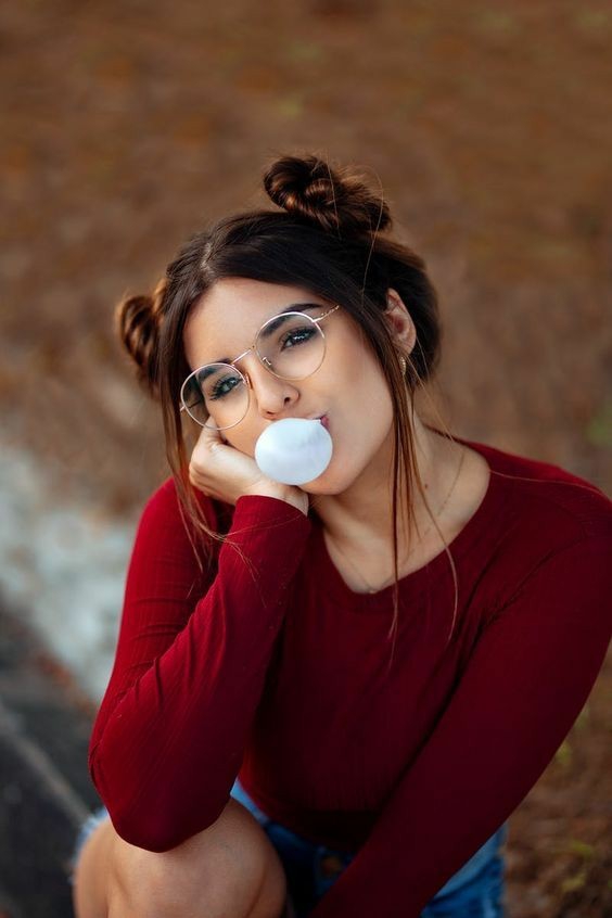 girl blowing bubble