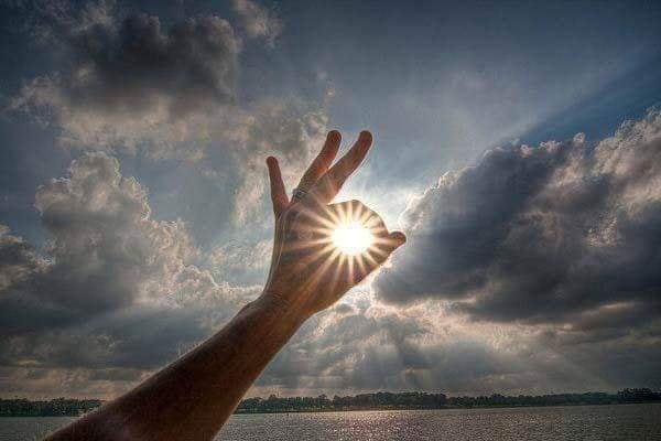 beautiful sun and hand