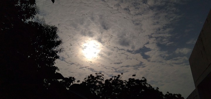 Sun peeps out of clouds