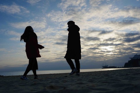 A couple in the rising sun