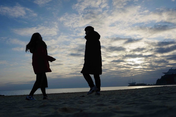 A couple in the rising sun