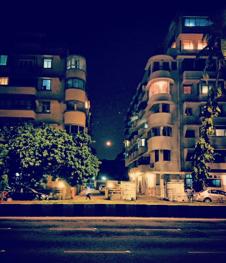 Full Moon between two Apartment Buildings